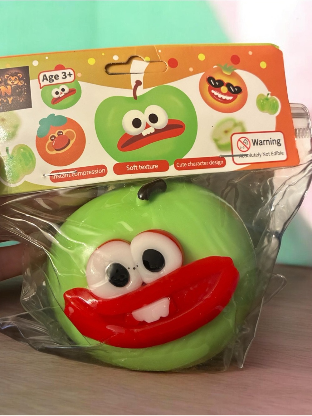 Squeeze Green Squishy Apple Face Toy with Red Mouth- Similar to Smushers